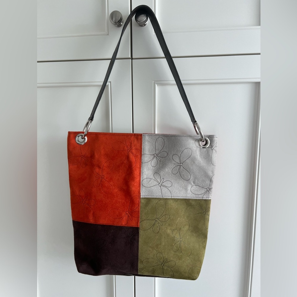 NWOT One Of A Kind hand bag. Artisanal design. Faux suede. Spacious tote.Chic!